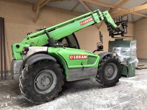 L'indispensable manitou pour mettre en place les machines dans le nouvel atelier